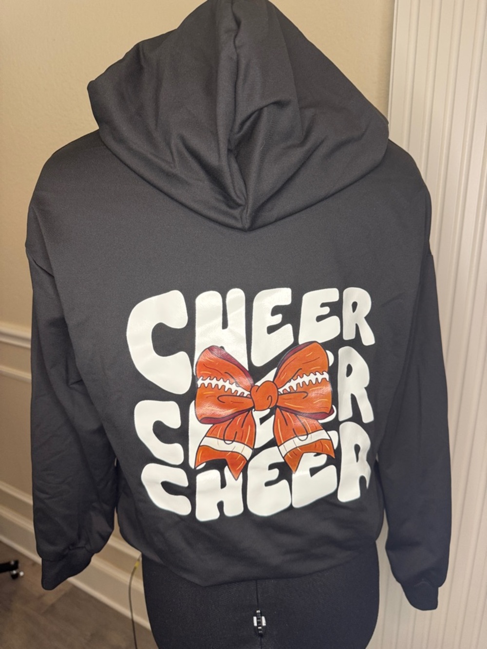 Black Cheer Graphic Hoodie with Orange Bow